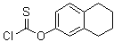 CAS 登录号：84995-63-1, O-(5,6,7,8-四氢-2-萘基)硫代氯甲酸酯